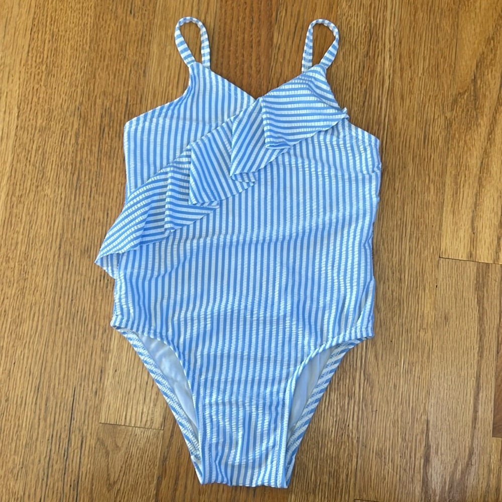 Old Navy girls striped ruffle swimsuit. Blue and white vertical stripe